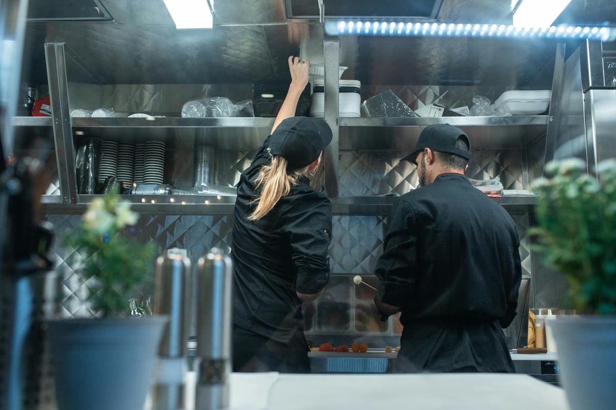 Chefs working in a professional commercial kitchen